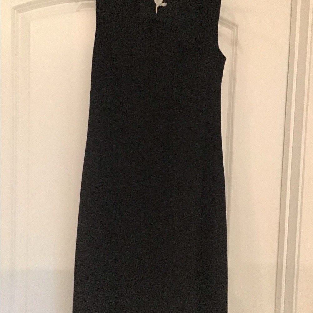 Cute little black dress with a unique neckline